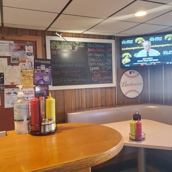 Sharp's Tavern - Corner booth at end of the bar. Specials board. - Pizza Near Me - Palestine, Ohio Sharp's Tavern - Corner booth at end of the bar. Specials board. - Pizza Near Me - Palestine, Ohio