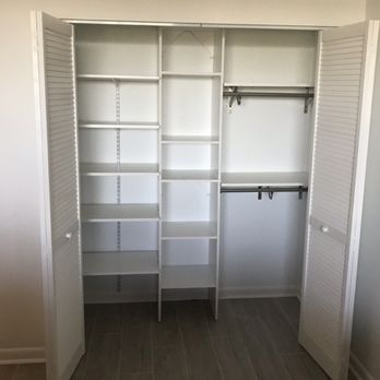 She's At Your Service - Bedroom closet after organization kit was built - General Contractors Near Me - Navarre, Florida She's At Your Service - Bedroom closet after organization kit was built - General Contractors Near Me - Navarre, Florida