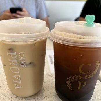 Cafe Pruvia - Seins visit!  Coffee latte(my friend's - Left)  Peach black tea with 1oz peach syrup no sugar and boba (Right) - Bubble Tea Near Me - Gardena, California