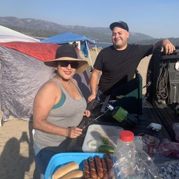 Cooking up some Costco hot dogs and carne asada!