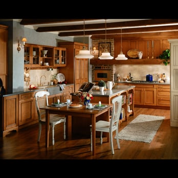 The Cabinetry Shop - a kitchen with a table and chairs - Cabinetry Near Me - Racine, Wisconsin The Cabinetry Shop - a kitchen with a table and chairs - Cabinetry Near Me - Racine, Wisconsin