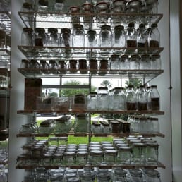 Wall of glass containers at the Container Store Wall of glass containers at the Container Store