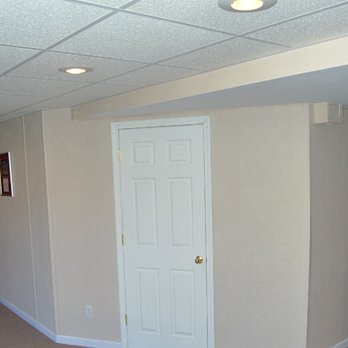 Craftsman Builders - an empty room with a door and carpet - General Contractors Near Me - Lockport, Illinois Craftsman Builders - an empty room with a door and carpet - General Contractors Near Me - Lockport, Illinois
