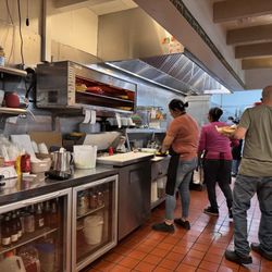 Duran Central Pharmacy - The crew with expediter pulling hot plates from the sally, like whoa!
