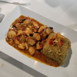 Mofongo in spicy criollo sauce