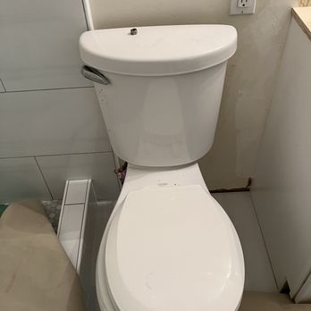 Maika'i Construction - Tiles leaving no room for towel bars on 2 walls.Visually unappealing and not functional. Can't even put metal cap back on toilet water pipe. - General Contractors Near Me - Honolulu, Hawaii