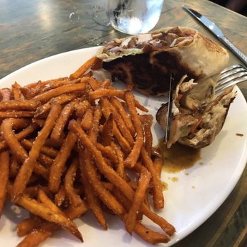 Mad Cow Grill - Jerk chicken wrap and sweet potato fries. - American Near Me - Laurel, Maryland
