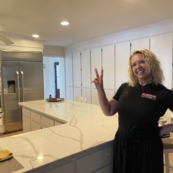 Floor It And More - a woman standing in a kitchen - General Contractors Near Me - Huger, South Carolina