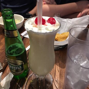 Seis Vecinos Restaurant - Pina Coladas and beer on deck. - Latin American Near Me - Bronx, New York