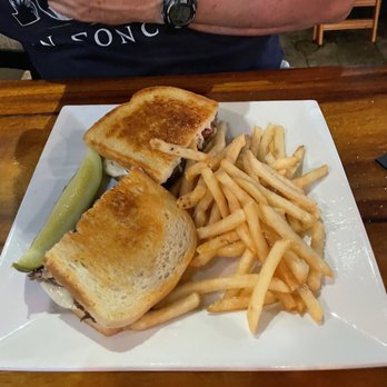 O'Bricks - BS roast beef layered with sautéed peppers and onions, melted provolone and horseradish cream - New American Near Me - Bradenton, Florida