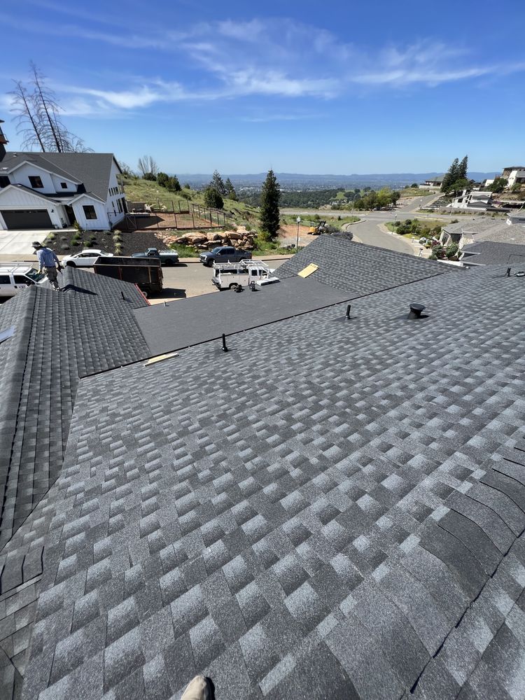 Slide of E Sanchez roofing