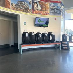 Mavis Tires & Brakes - Very nice area to sit and plenty places to walk to grab a bite. They also are very fast