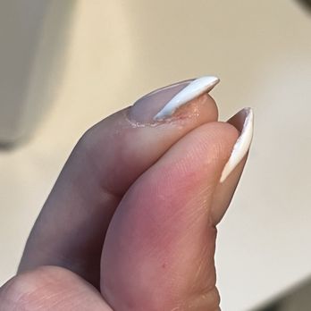 Blossom Nail Spa -  Campbell - Cut around the nail of the index finder - Nail Salons Near Me - Campbell, California