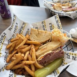 Rock’n Deli - Reuben with fries and Pickles.
