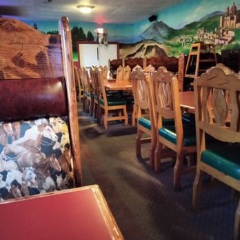 El Rancho Viejo - a dining room with a mural on the wall - Mexican Near Me - Ridgefield, Washington El Rancho Viejo - a dining room with a mural on the wall - Mexican Near Me - Ridgefield, Washington