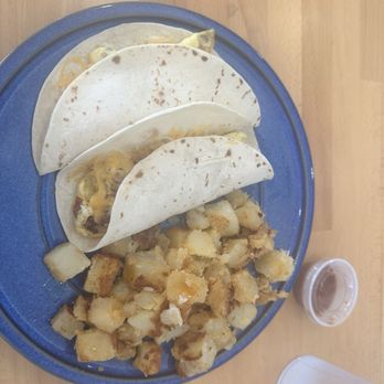 Country Scrambled Cafe - Breakfast Tacos with bacon and sausage side of grill potatoes - Breakfast & Brunch Near Me - Spring, Texas