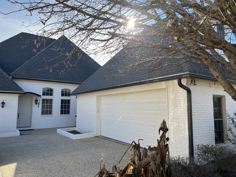 Slide of Pine Belt Gutters