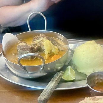 Akadi PDX - Egusi stew with goat and fufu - African Near Me - Portland, Oregon Akadi PDX - Egusi stew with goat and fufu - African Near Me - Portland, Oregon