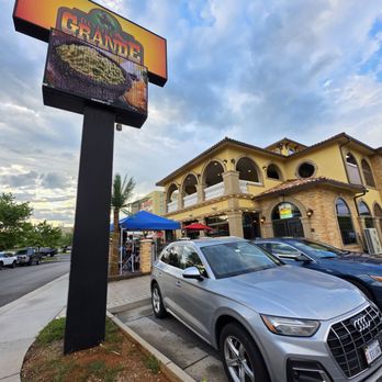 Rodeo Grande - The exterior of the restaurant with its parking lot sign under a beautiful blue sky of a special "Cinco de Mayo" day. - Mexican Near Me - Roanoke, Virginia