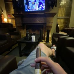 En Fuego Tobacco Shop - Lounge area with a Rocky P