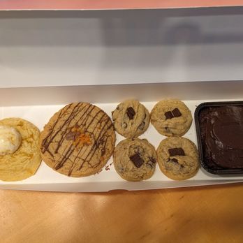 Crumbl - Mountain View - Cookie assortment with cornmeal, peanut butter crisp, semi sweet chocolate chunk mini cookies, and fudge brownie - Bakeries Near Me - Mountain View, California