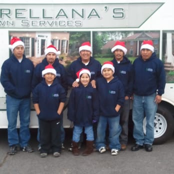 Orellana Lawn Services - a group of people wearing santa hats - Lawn Services Near Me Orellana Lawn Services - a group of people wearing santa hats - Lawn Services Near Me