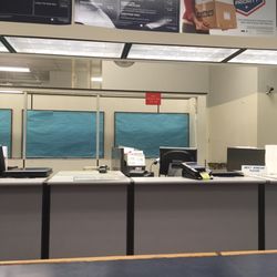 US Post Office - Please add more people at the window...