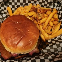 Big Boi BBQ - Sliced smoked brisket sandwich and fries.