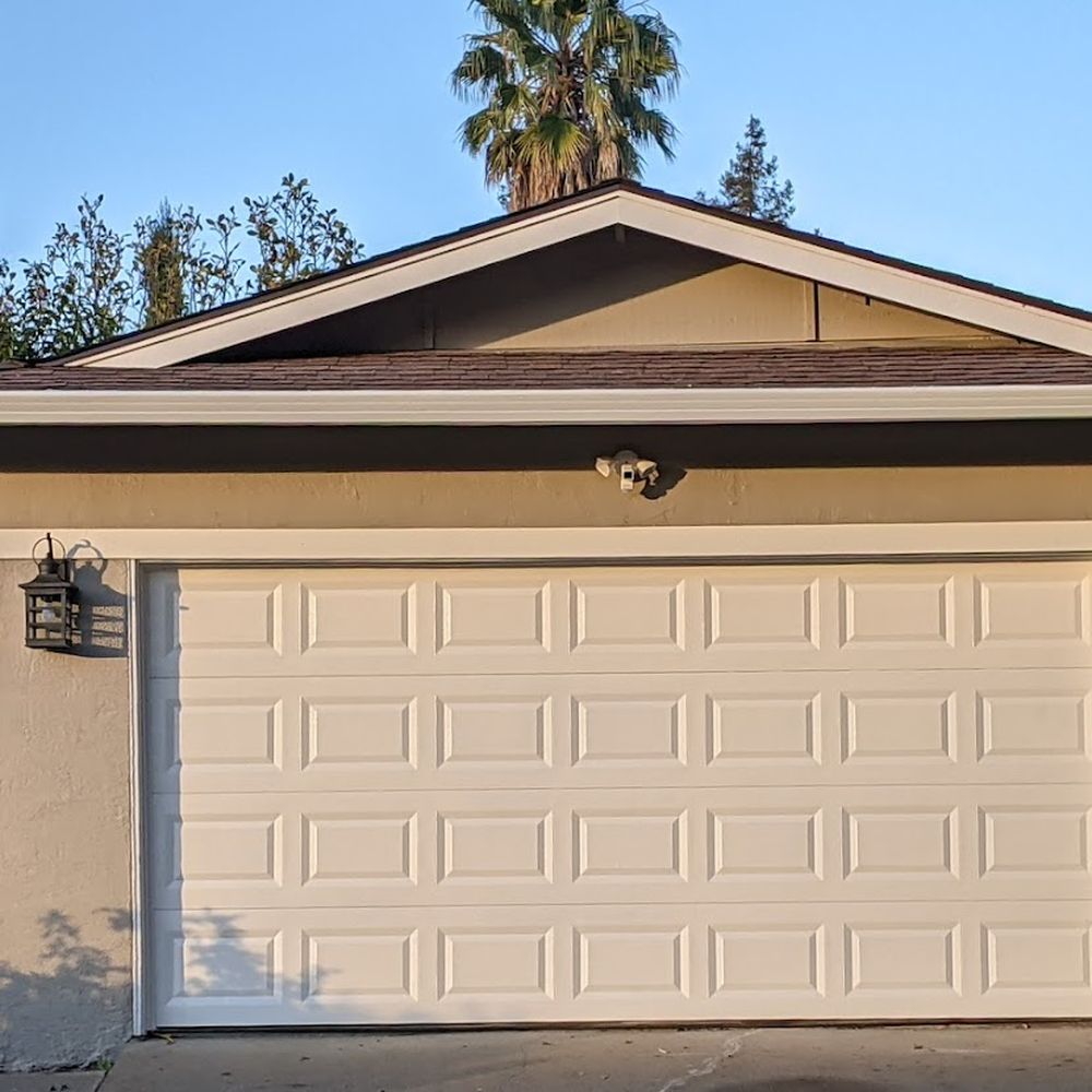 Palumbo Construction - New lights on either side of garage door with new spotlight/security camera. - General Contractors Near Me