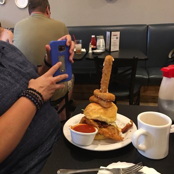 Maple Leaf Diner - Chicken and biscuit with cheese sticks attached to it. - American Near Me - Dallas, Texas Maple Leaf Diner - Chicken and biscuit with cheese sticks attached to it. - American Near Me - Dallas, Texas