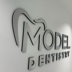 Model Dentistry - Timothy R Raborn, DDS - Hallway Logo