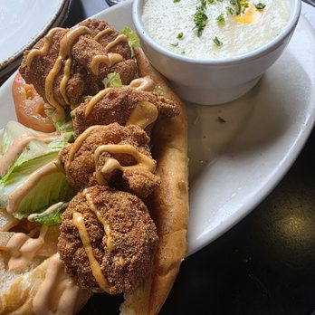 Whisk Breakfast & Brunch - Shrimp Po Boy with side of cheese grits. - Breakfast & Brunch Near Me - East Point, Georgia Whisk Breakfast & Brunch - Shrimp Po Boy with side of cheese grits. - Breakfast & Brunch Near Me - East Point, Georgia