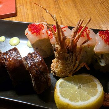 Morimoto - Land and Sea roll close up with Wagu on the left and sweet shrimp on right. Great presentation. - Japanese Near Me - Las Vegas, Nevada Morimoto - Land and Sea roll close up with Wagu on the left and sweet shrimp on right. Great presentation. - Japanese Near Me - Las Vegas, Nevada