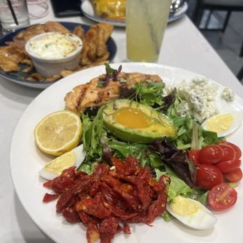 Cat Cora's Kitchen - Cobb salad with Salmon - New American Near Me - Atlanta, Georgia Cat Cora's Kitchen - Cobb salad with Salmon - New American Near Me - Atlanta, Georgia