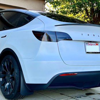 Genesis Window Tinting - Tesla Model Y Performance. Matte PPF, pillar delete, smoked headlights / taillights. Replaced Tesla logo with TESLA badge. - Home Window Tinting Near Me - Elk Grove, California
