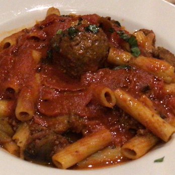 Papa Lozzi Italia - Mamma Nonno gravy with meatballs sausage mushrooms and pepper in a thick meat sauce - Italian Near Me - Orlando, Florida Papa Lozzi Italia - Mamma Nonno gravy with meatballs sausage mushrooms and pepper in a thick meat sauce - Italian Near Me - Orlando, Florida