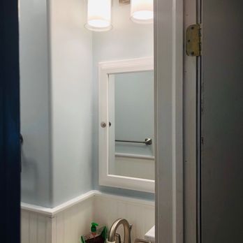 Superior Kitchen and Bath - a sink and mirror - General Contractors Near Me - Cromwell, Connecticut