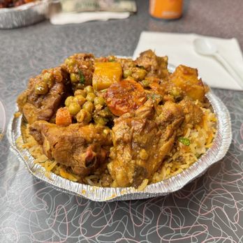 Desi Khabba - a bowl of food on a table - Pakistani Near Me - Buffalo, New York