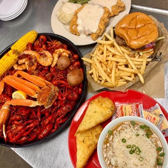 Crawfish Hideaway - a plate of crawfish, a bowl of soup, and a plate of fries - Southern Near Me - Dayton, Texas Crawfish Hideaway - a plate of crawfish, a bowl of soup, and a plate of fries - Southern Near Me - Dayton, Texas