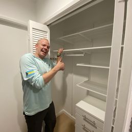 Completed installation of closet shelving and drawers