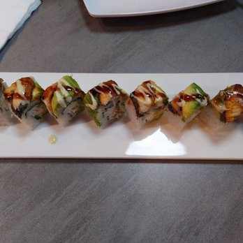 Sushi Fever - Dragon roll $12.20. The worst sushi I tried in my life! The eel is too small. Smith's sushi is better - Conveyor Belt Sushi Near Me - Albuquerque, New Mexico