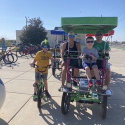 D R Bradley's Bike Rentals - One bench Surrey. Perfect for me, my wife and our little guy!