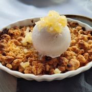 Photo of Crossroads - Los Angeles, CA, United States. Warm Peach Cobbler with Candied Ginger Ice Cream