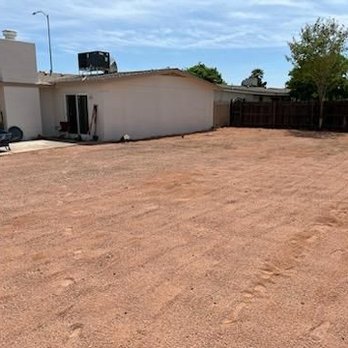 Henderson Landscaping - This is what my backyard looked like after the removal of all of the weeds and after the rocks were laid out - Landscaping Near Me