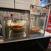 Photo of 2 Bros Pizza - New York, NY, United States. Pizza Display