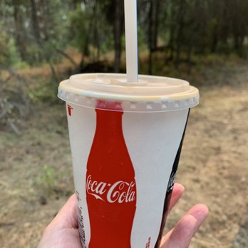 Tugboats - a hand holding a coca cola cup - Burgers Near Me - Curlew, Washington Tugboats - a hand holding a coca cola cup - Burgers Near Me - Curlew, Washington
