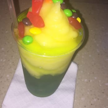 Clock Bar - This is called a F you. Slushy drink on the top and mixed on the bottom. Topped w Swedish fish and skittles. - Bars Near Me - Philadelphia, Pennsylvania Clock Bar - This is called a F you. Slushy drink on the top and mixed on the bottom. Topped w Swedish fish and skittles. - Bars Near Me - Philadelphia, Pennsylvania