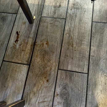 Sikdorak III - Oil from the grill dripping on the floor - Korean Near Me - Aiea, Hawaii Sikdorak III - Oil from the grill dripping on the floor - Korean Near Me - Aiea, Hawaii