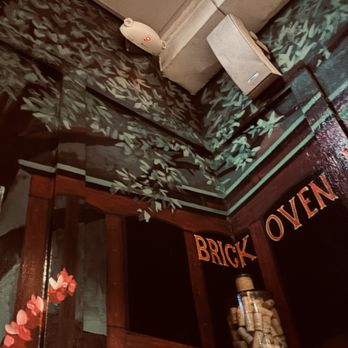 Clemente's Trolley Pizzeria - The mural behind our booth - Pizza Near Me - Key West, Florida