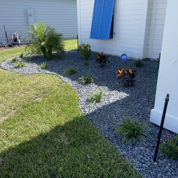 The Lawn Barber X - Flower bed maintenance grey granite rock ! Add on - Lawn Services Near Me The Lawn Barber X - Flower bed maintenance grey granite rock ! Add on - Lawn Services Near Me
